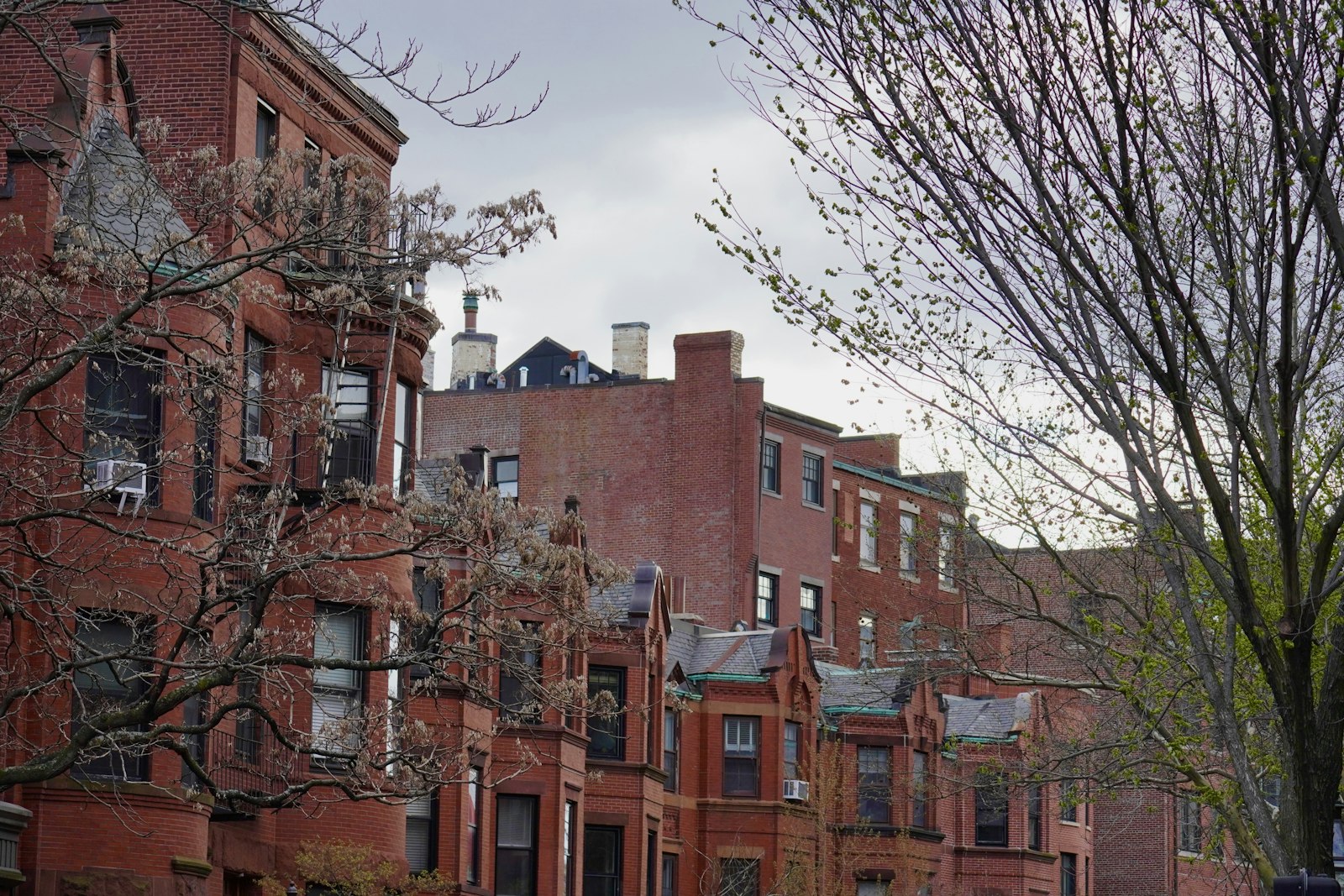 A row of historic red-brick buildings in Boston